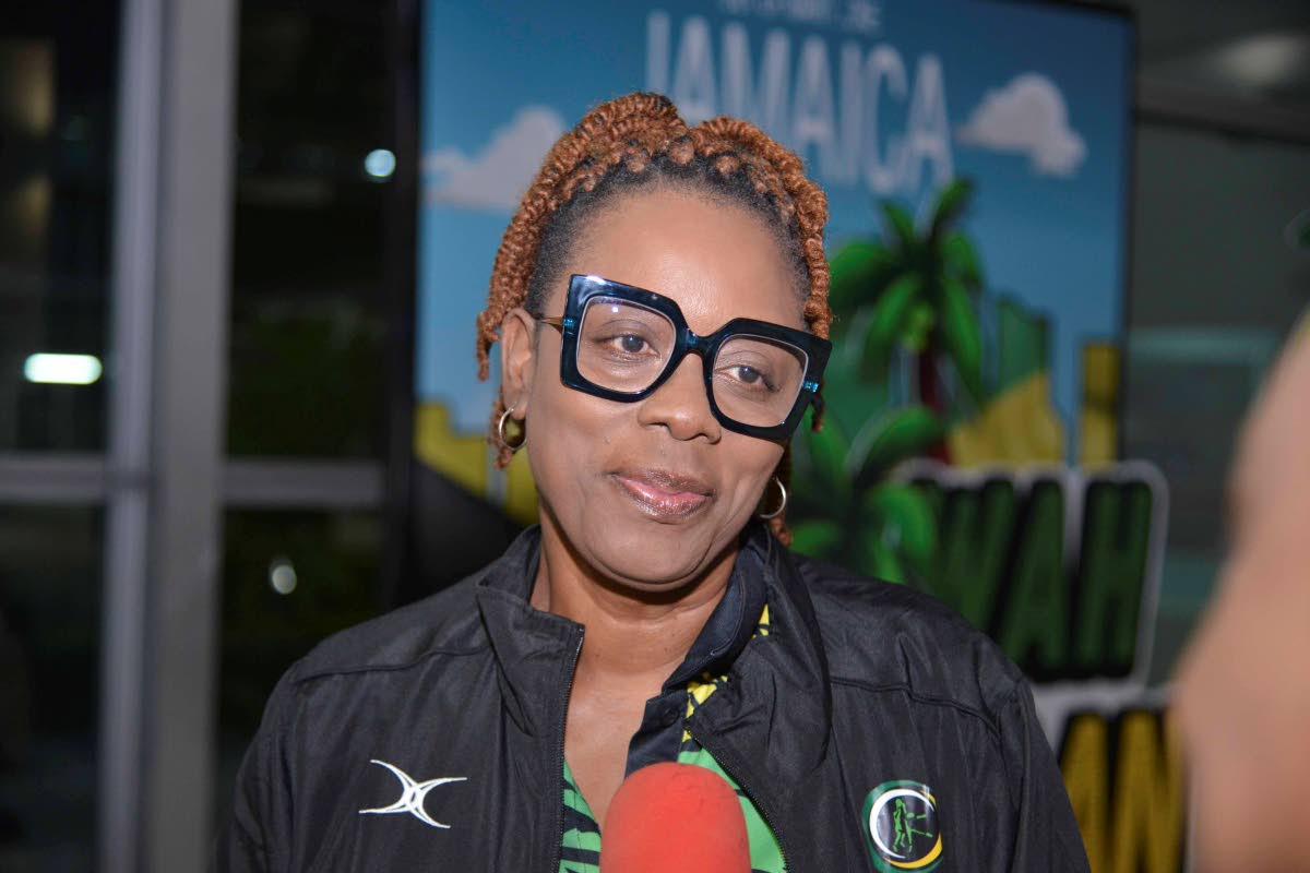 Jamaica’s under-21 Sunshine Girls coach, Annett Daley, speaks with The Gleaner after her arrival at the Norman Manley International Airport from the World Netball Youth Cup in Gibraltar yesterday.  