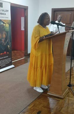 Minister of Gender, Entertainment and Sport Olivia Grange addressing the audience at the opening of the ‘One Nation, New Symbols’ exhibition at the National Gallery of Jamaica, located in Kingston Mall, downtown Kingston, on Sunday, September 28.