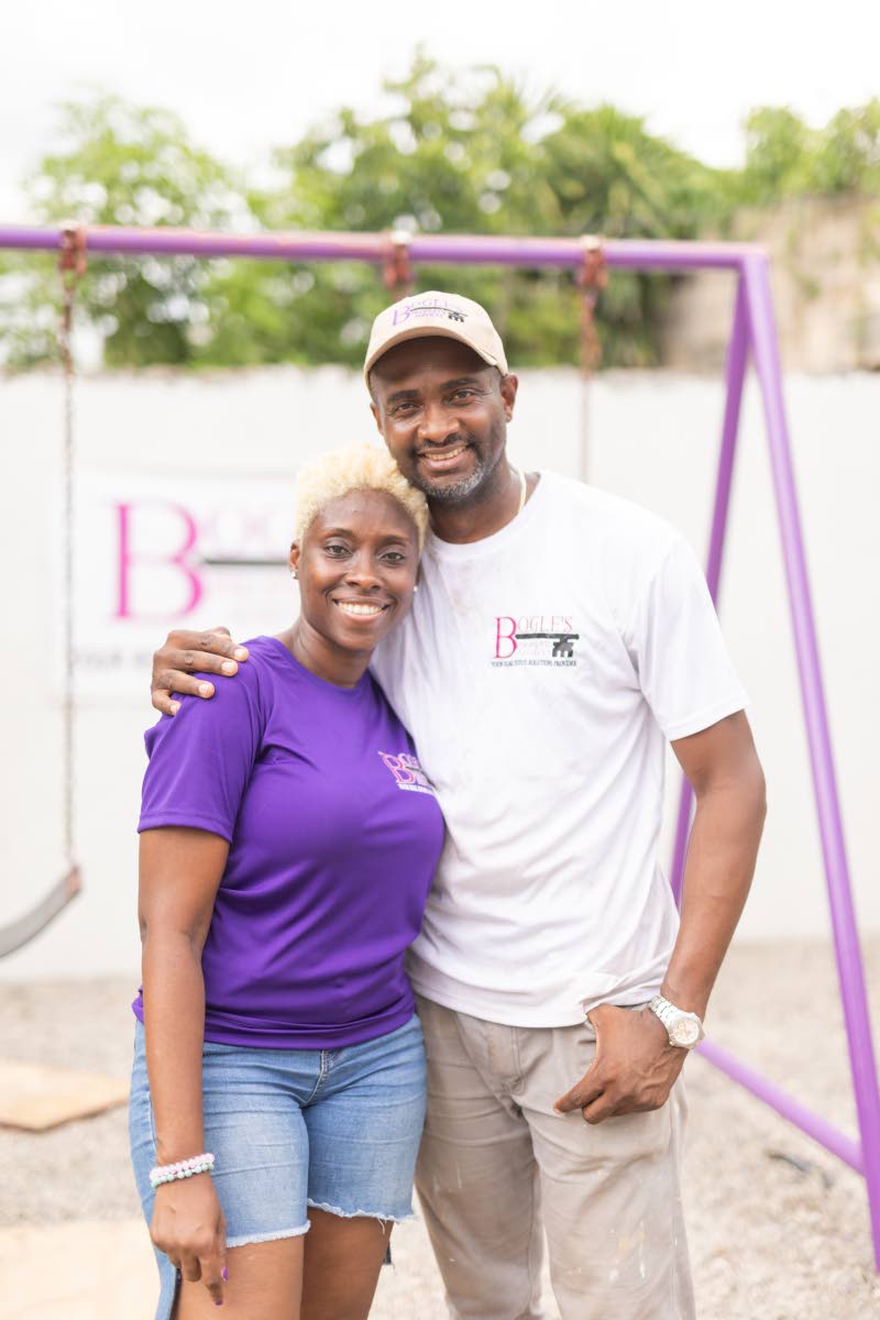 Husband-and-wife duo Nicholas Bogle and Tamara Grant-Bogle, founders of Bogle’s Property Services, are all smiles.