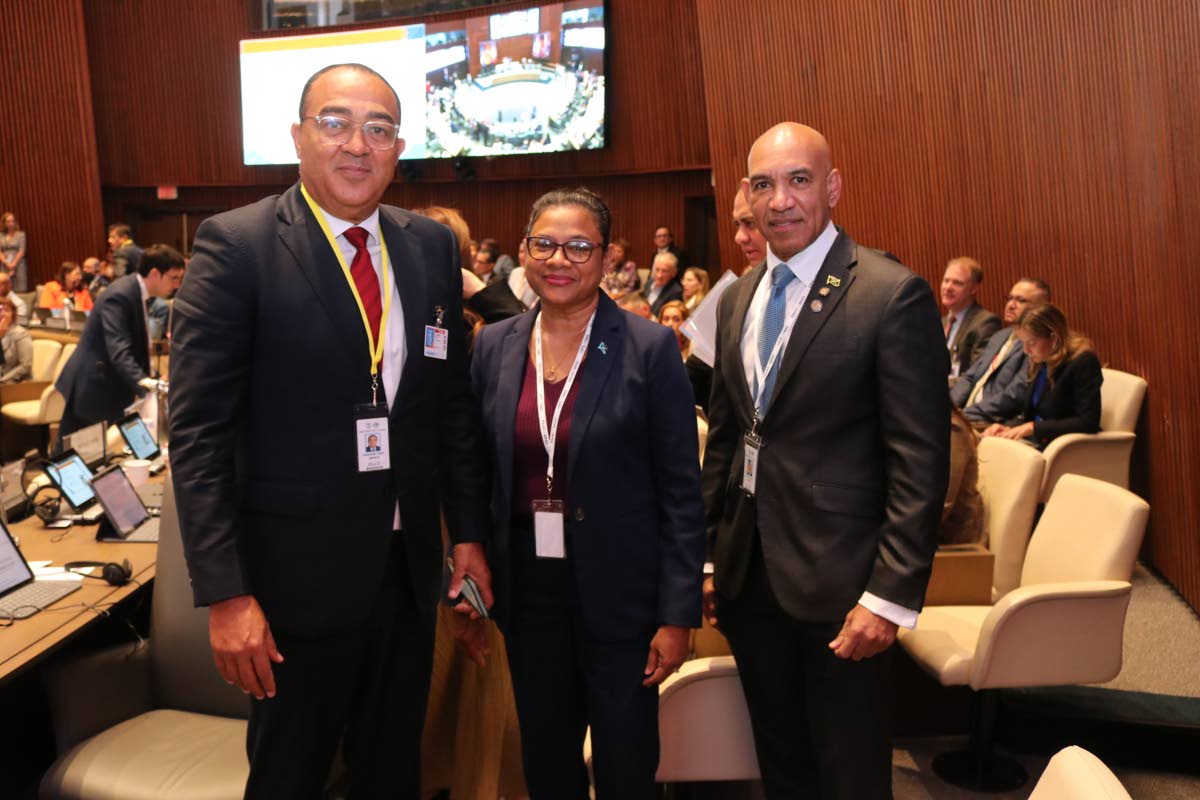 Minister of health and wellness, Dr.  Christopher Tufton; chief medical officer of health, Dr. Jacquilin Bisasor-Mckenzie; and Jamaica’s ambassador to the United States, Major General (Rtd) Antony Anderson, sharing a light moment at the 62nd Directing Co
