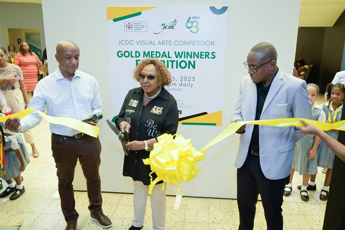 Minister of Culture, Gender, Entertainment and Sport Olivia Grange cuts the ribbon to open the Jamaica Cultural Development Commission’s (JCDC) 2025 Visual Arts Competition Gold Medal Winners Exhibition at the Olympia Art Centre in St Andrew on October 2