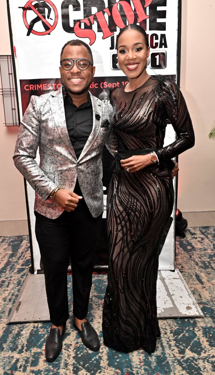 Garfene Grandison (left), corporate communications manager of J. Wray & Nephew, and host and author Dr Terri-Karelle Johnson, match in black and silver.