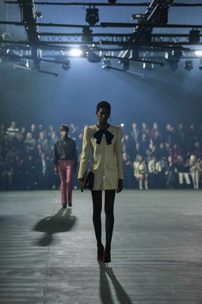 Top right: A model wears a minimalist design from Valentino’s Spring/Summer 2026 collection in Paris, where simplicity and refined colour replaced ornament and excess.