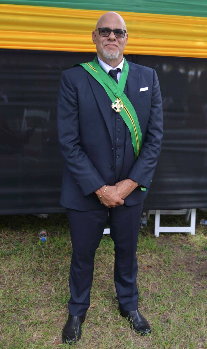 Chief Executive Officer of the JMMB Group Keith Duncan stands proud following his appointment as a member of the Order of Jamaica.