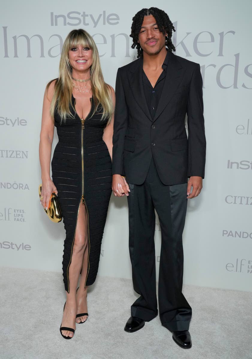 Left: German-American model Heidi Klum brings her son, Henry Samuel, as her plus one for the evening.