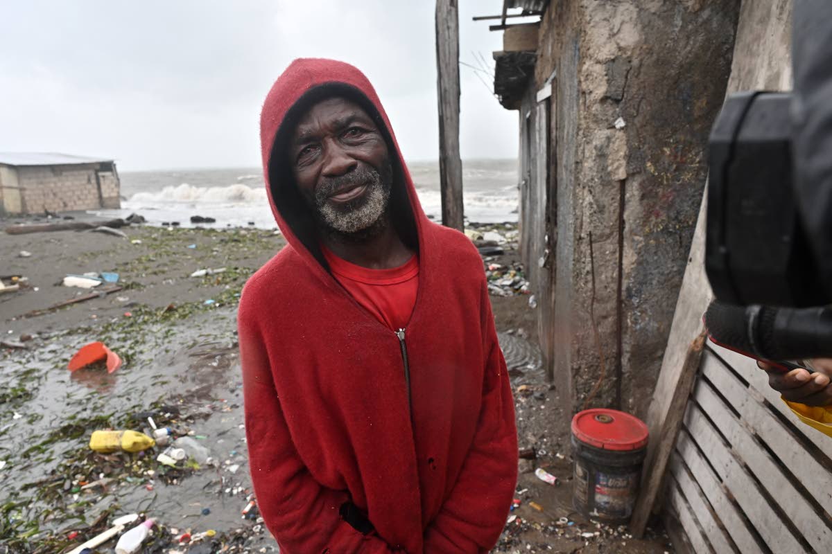 Basil Smith, who lives in a makeshift hut near the Portmore fishing village, said he intended to stay put amid Hurricane Melissa on Monday.