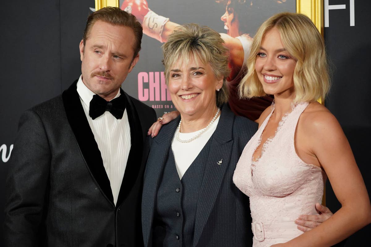 Boxing legend Christy Martin is flanked by the co-stars of the ‘Christy’ biopic, Ben Foster and Sydney Sweeney (right). 