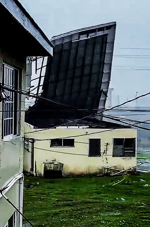 A section of the roof at the Savanna-la-Mar Hospital being blown off on Tuesday.