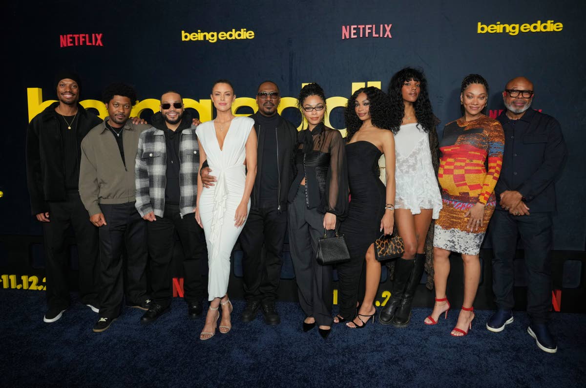 From left: Miles Mitchell Murphy, Christian Murphy, Eric Murphy, Paige Butcher, Eddie Murphy, Bella Murphy, Shayne Audra Murphy, Zola Ivy Murphy and Bria Murphy arrive at the premiere of ‘Being Eddie’ on Wednesday at Netflix Tudum Theater in Los Angele