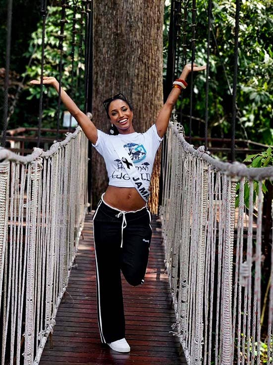 Dr Gabrielle Henry strikes a playful pose following lunch at the Three Monkeys Restaurant in Thailand.