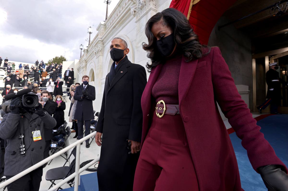 Former President Barack Obama and former First Lady Michelle Obama arrive to attend the 59th Presidential Inauguration at the US Capitol in Washington, January 20, 2021, as Joe Biden was sworn in as the 46th president of the US and Kamala Harris became the