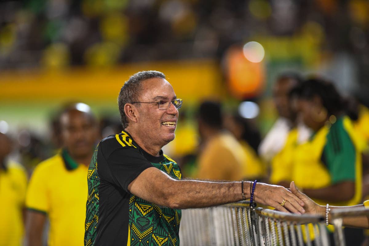 Minister of Science, Energy, Telecommunications and Transport of Jamaica Daryl Vaz wears the Jamaica 24 away jersey, one of the most popular recent designs. 