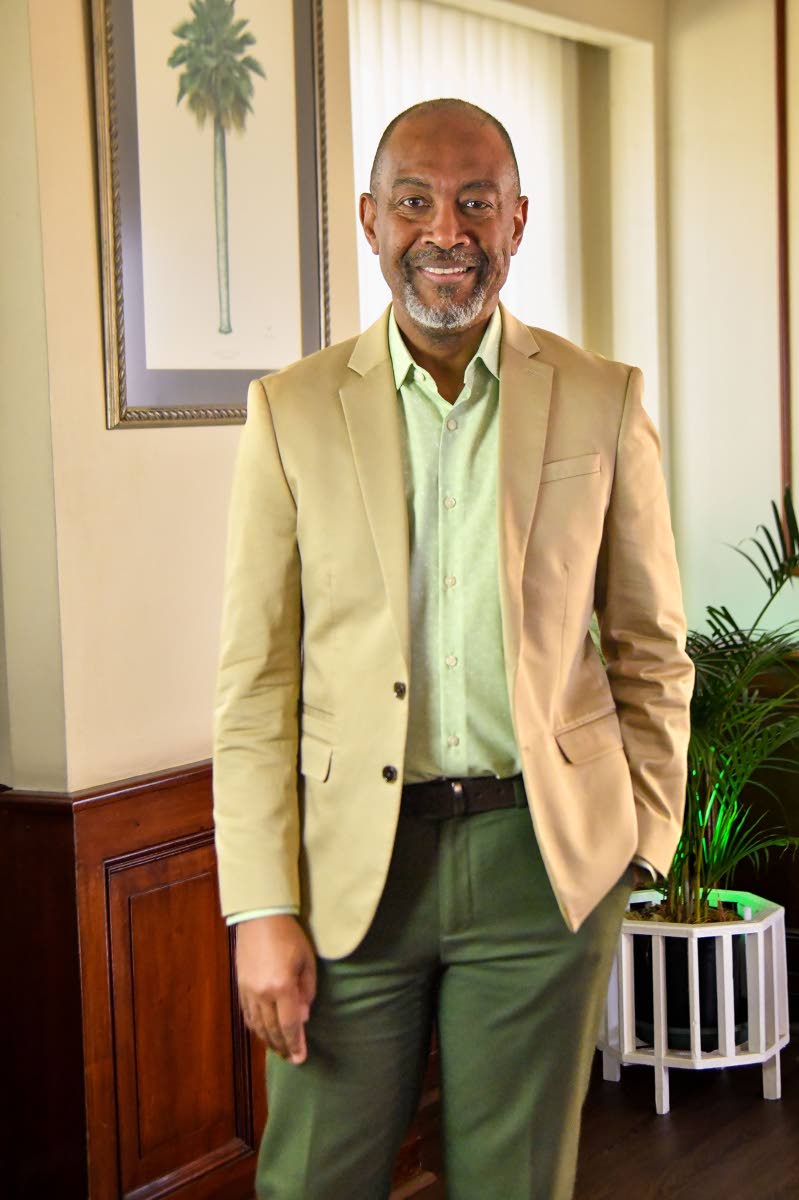 Left: Now principal director of the Meteorological Service of Jamaica, Evan Thompson has spent the last 37 years in the field of meteorology.