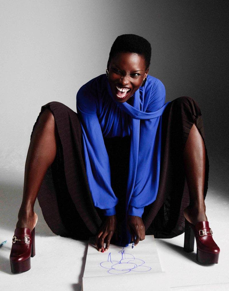 Booth wears a shirt and skirt from Proenza Schouler and Gucci shoes in her ‘Perfect Magazine’ fashion story. 