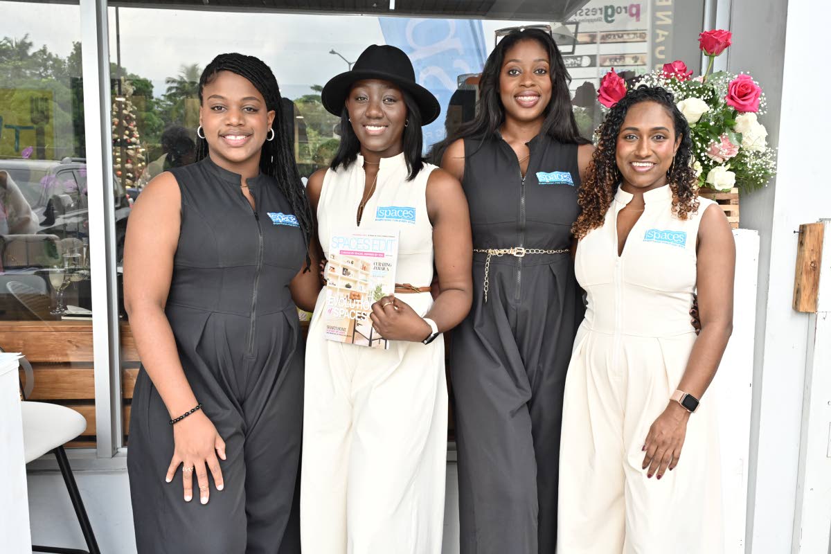 The Spaces Jamaica team pose for our lens. From left: Janine Boulevard, administrative assistant; Brianna White, senior sales consultant; Lee-Anne Jones, interior designer; and Tianna James, intern.