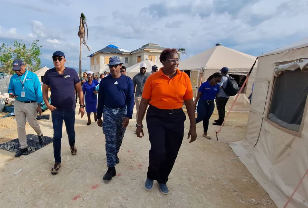 From left: St Andrae Sinclair, regional director, Western Regional Health Authority; Dr Christopher Tufton, minister of health and wellness; Lt Comm Anderson Goodridge, commander of the Barbados emergency medical team; and Captain Dr Ayana  Crichlow, clini