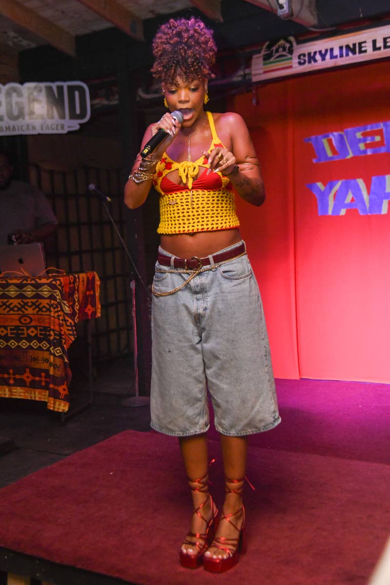 Above: Songbird Elle delivers melodies in red-and-yellow crochet, denim culottes, and red strappy platforms.
