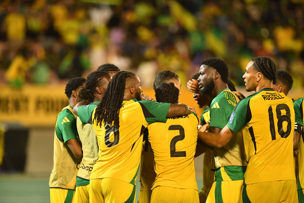 Jamaica’s Reggae Boyz celebrate after scoring against Trinidad and Tobago during a Concacaf Group B World Cup qualifier at the National Stadium in October. Jamaica won 2-0. 