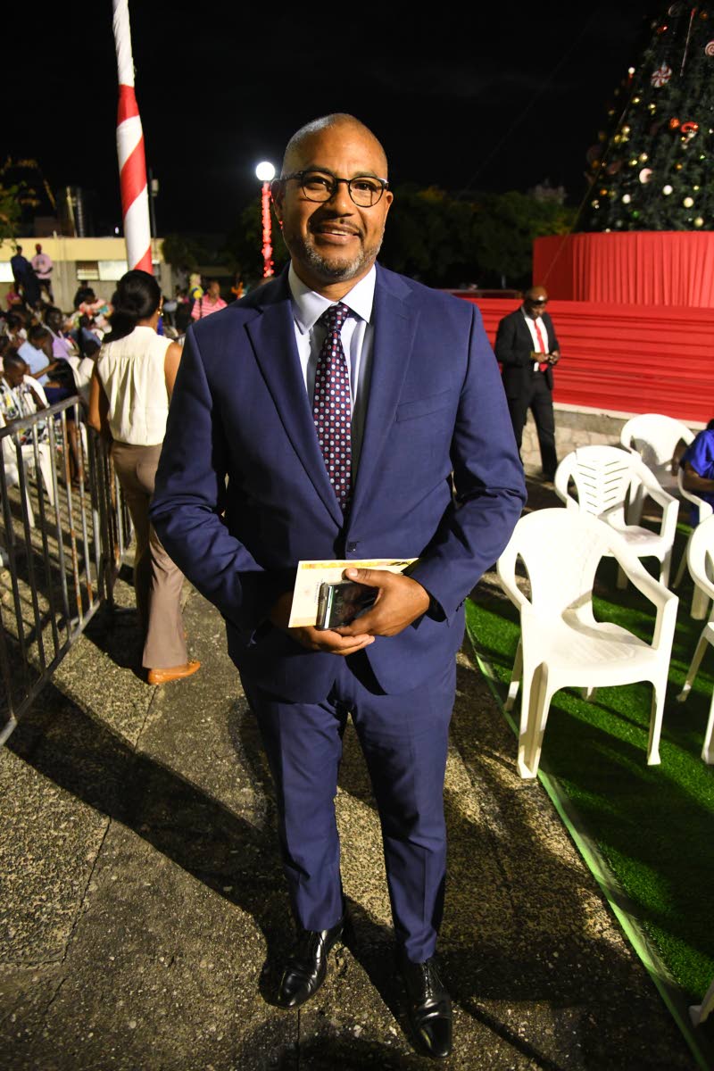 Taking a photo for our lens is Mikael Phillips, member of parliament for Manchester North Western, who represented Opposition Leader Mark Golding.