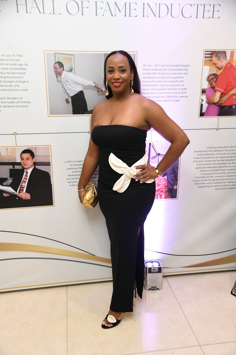 Chief Executive Officer of Supreme Ventures Services Limited, Krista Fisher, opts for this curve-hugging black dress with a pop of white in the bow.