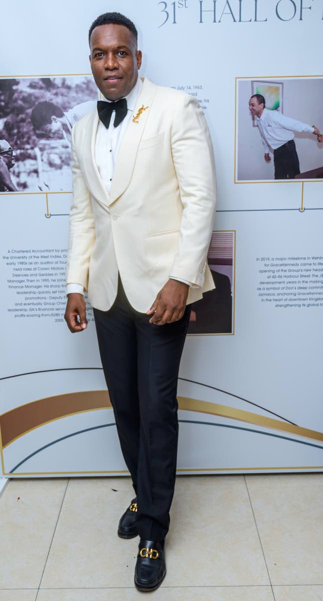 Brandon Ferguson, unit manager at the National Commercial Bank, in modern tailoring by Suit Supply.