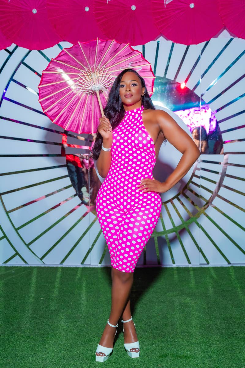 Denico Stewart decides on a polka-dot look by JLorraine Designs.