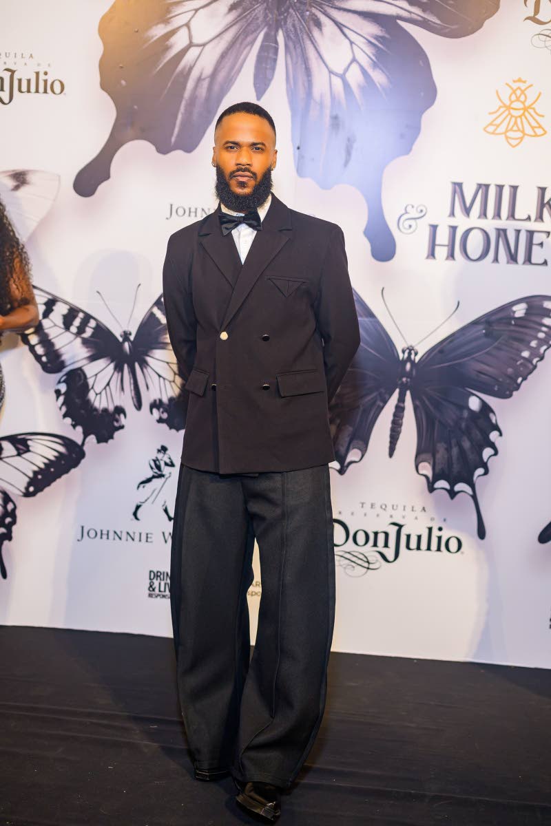 Karda Taylor makes a sharp statement in a JW Anderson ensemble, pairing barrel pants with Bershka boots.