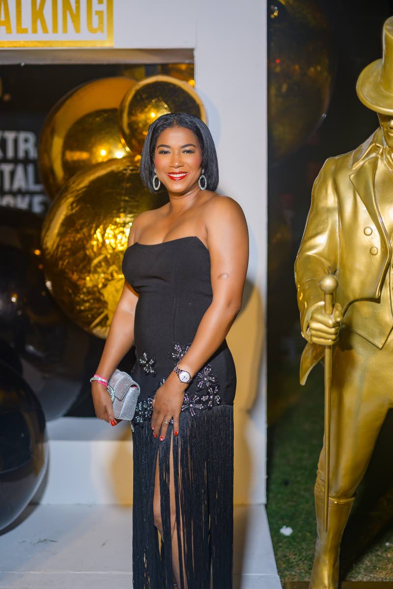 Tyheissa Williams, brand and corporate public relations manager at Red Stripe, adds a touch of sparkle to her look, accessorising with silver.