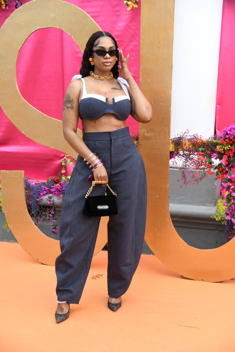 Ymonne Wilson, owner of Ymonne’s Closet, swipes right on a structured two-piece set from her boutique, accessorised with a mini top-handle bag and sleek sunglasses.