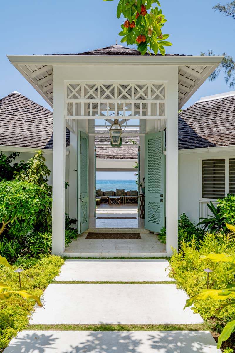 The dramatic front entrance leads to an open-air courtyard with astounding seaviews.