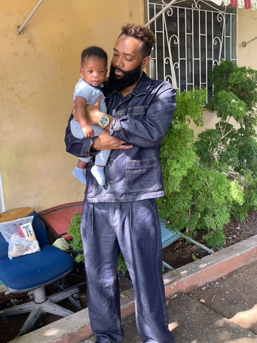 Smith spends some quality time with his baby nephew, Zemari.