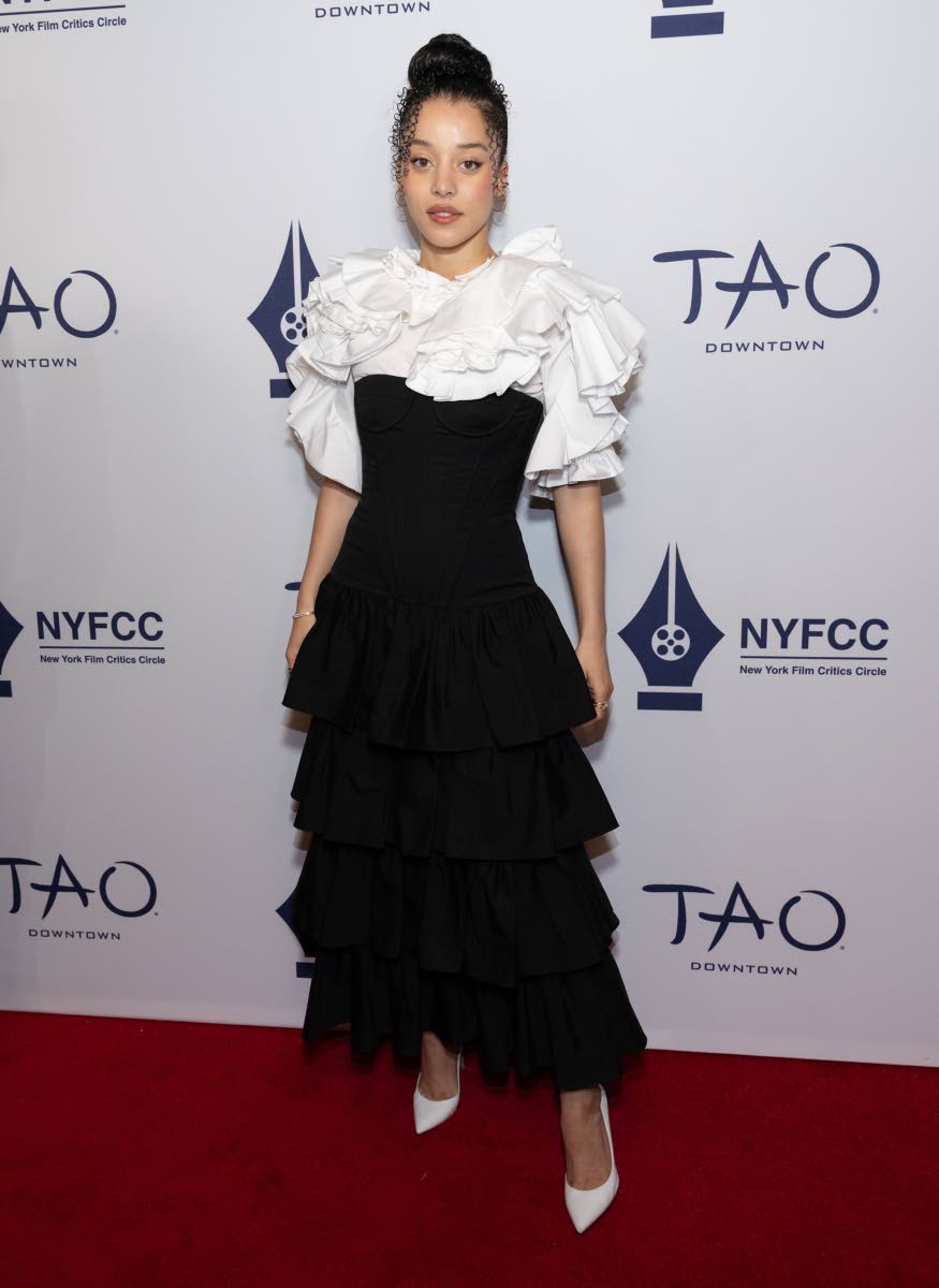 Chase Infiniti attends the New York Film Critics Circle Awards wearing Carolina Herrera and Gianvito Rossi. 