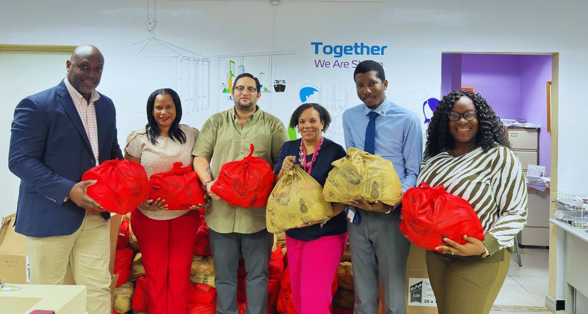  From left: Terrence Brooks, GM, SAJ; Dania Shaw-Smith, sales manager, ZIM–Carib Star; Carlos A. Murillo C., GM, ZIM–Carib Star; Corah Ann Robertson-Sylvester, president, SAJ; Gregory-Paul Campbell, CFO, ZIM–Carib Star; and Natalie Nugent-Soocka, tra