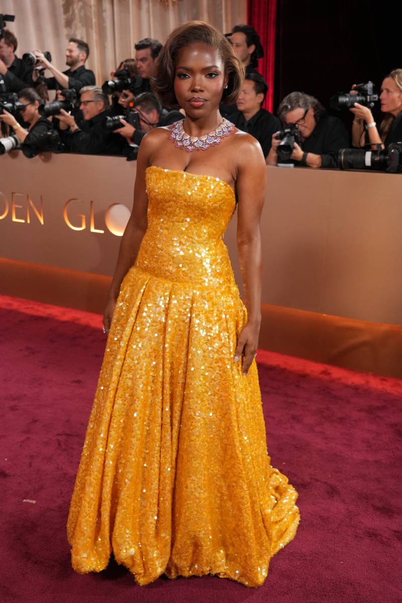 Ryan Destiny wears custom Balenciaga and Chopard jewellery. 