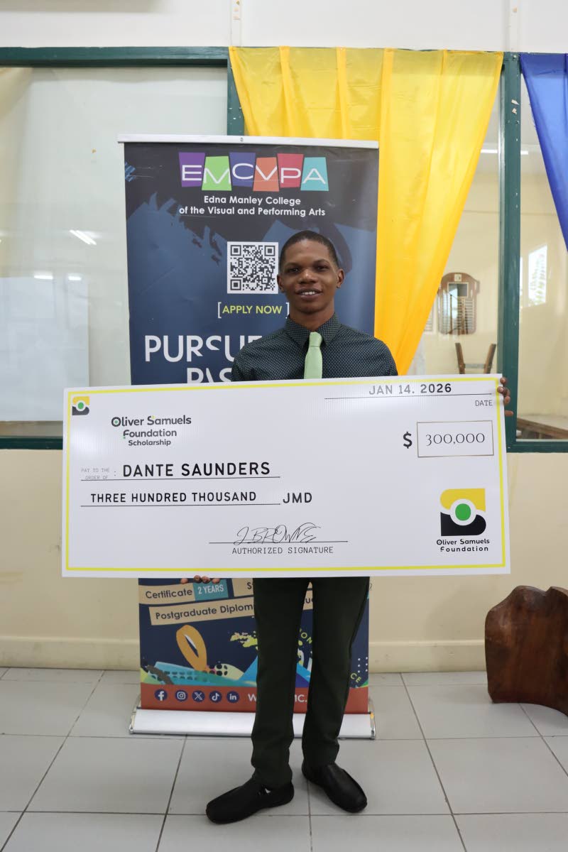 A proud Dante Saunders poses with his $300,000 cheque as the inaugural recipient of the Oliver Samuels Foundation Scholarship.