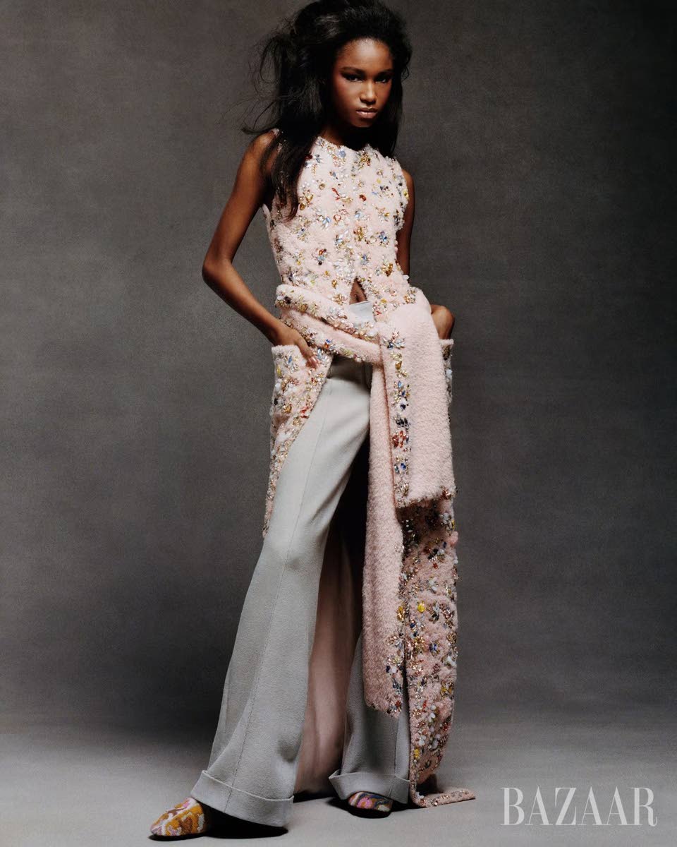 Coat, pants and mules, all by Louis Vuitton, curated by fashion editor Carlos Nazario. 