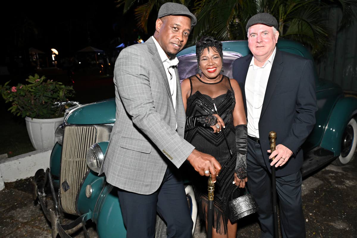 Winsome Gibbs (centre), country manager of CG United Insurance Ltd (Jamaica), is flanked by her colleagues Corey Brathwaite (left), director of operations and Mark Sommerville, group business development manager, in this group photo.