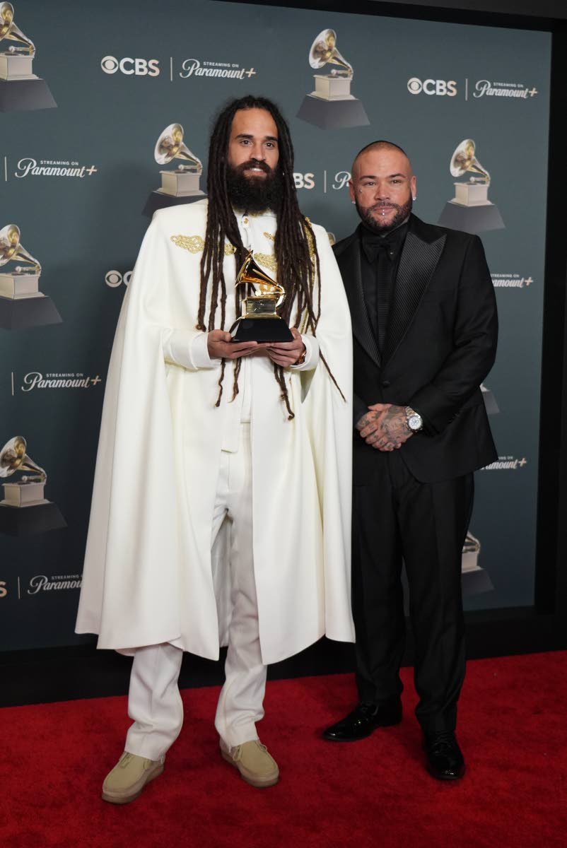 Fresh off his Grammy win for Best Reggae Album, Keznamdi (left) celebrates ‘Blxxd & Fyah’ alongside the project’s producer, Danny Barros.