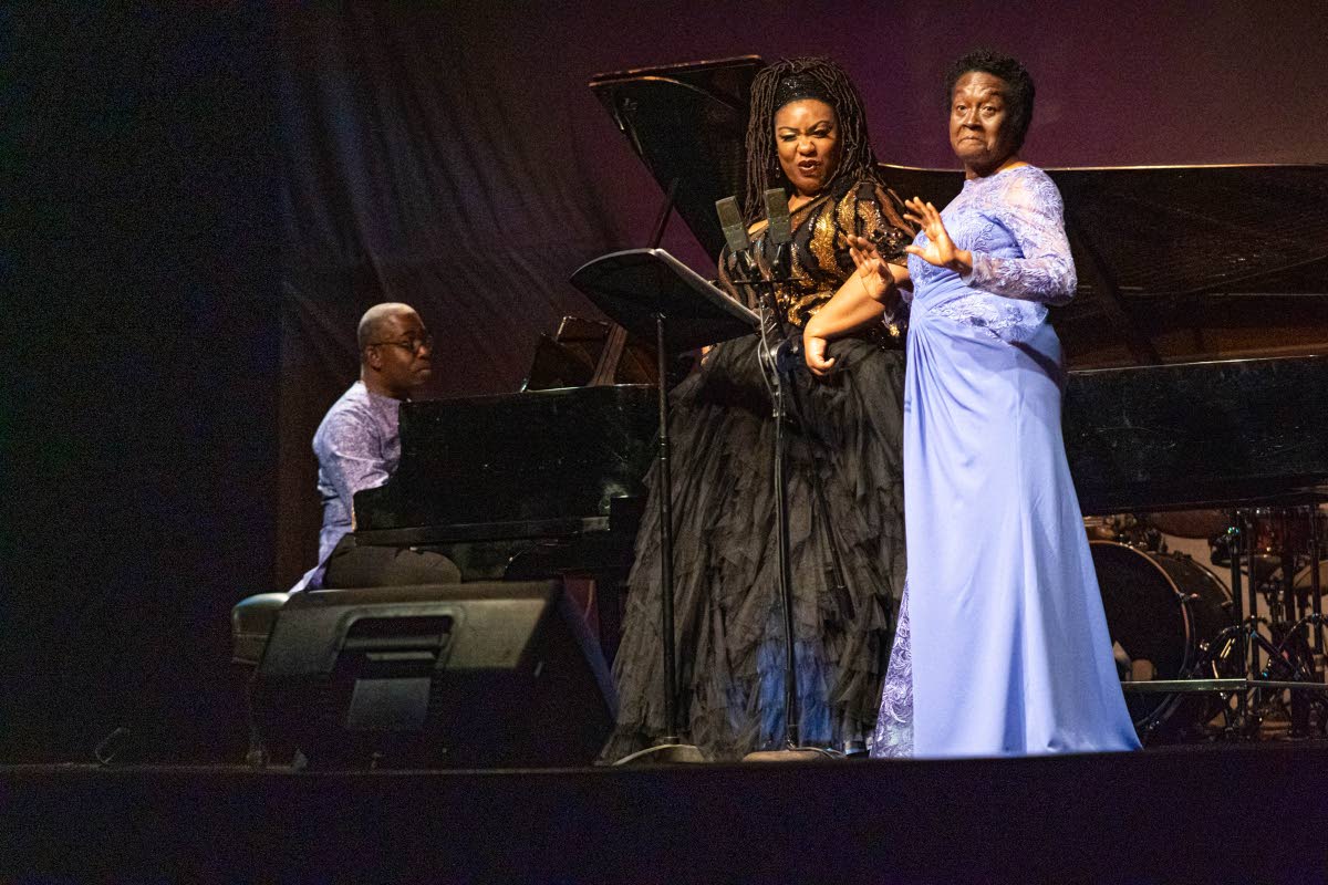 Mezzo soprano Raehann Bryce-Davis (left) is joined on stage by her mother, Hortensia Bryce.