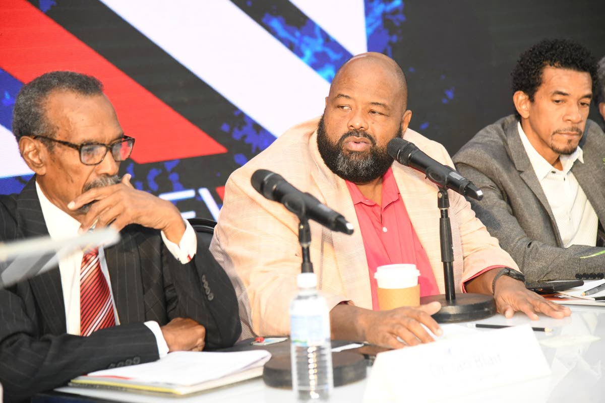From left: Dr Ian Blair, acting chairman; Solomon Sharpe, CEO; and Richard Bair, COO, address shareholders at the Main Event Entertainment Group Limited annual general meeting at the Spanish Court Hotel on St Lucia Ave in New Kingston on Thursday, July 6, 