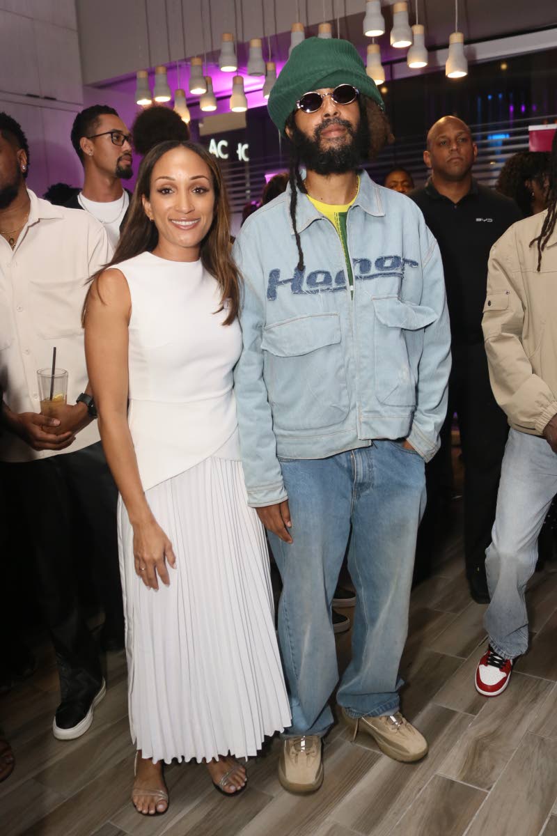 LeAnn Ollivierre, festival director, celebrates the occasion with Protoje.