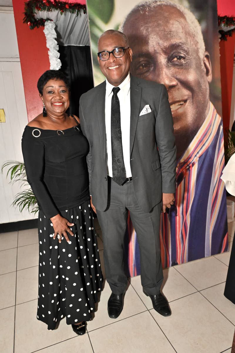 Minna Israel shares the frame with Brian Sang, general manager of The Jamaica Pegasus hotel.