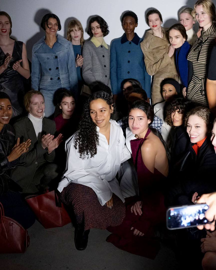 Post-show, a beaming Rachel Scott (crouching, at centre) shared a backstage moment with the models who walked for her inaugural Proenza Schouler collection.