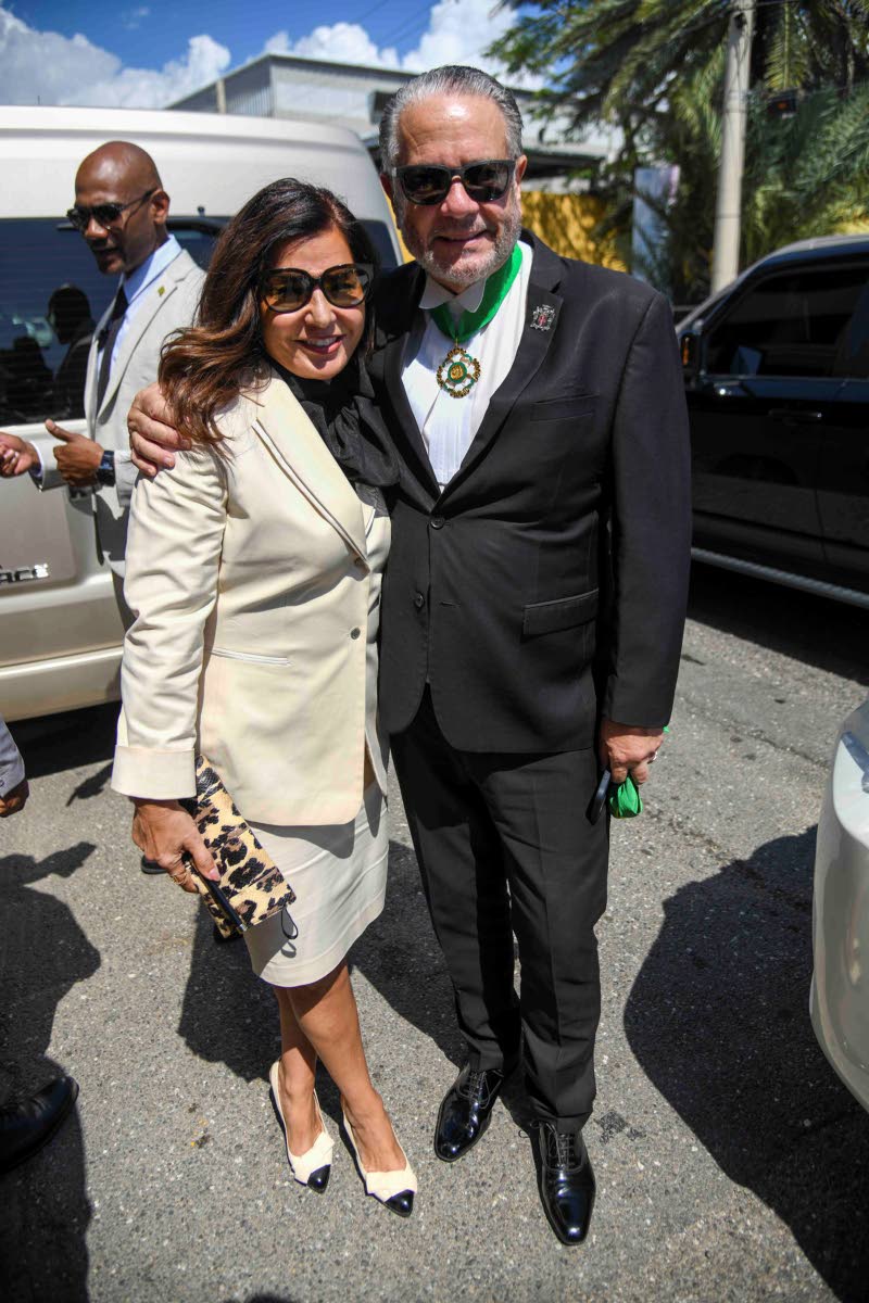 President of the Senate Tom Tavares-Finson (right) is joined at the opening of Parliament by his lovely wife, Rose.
