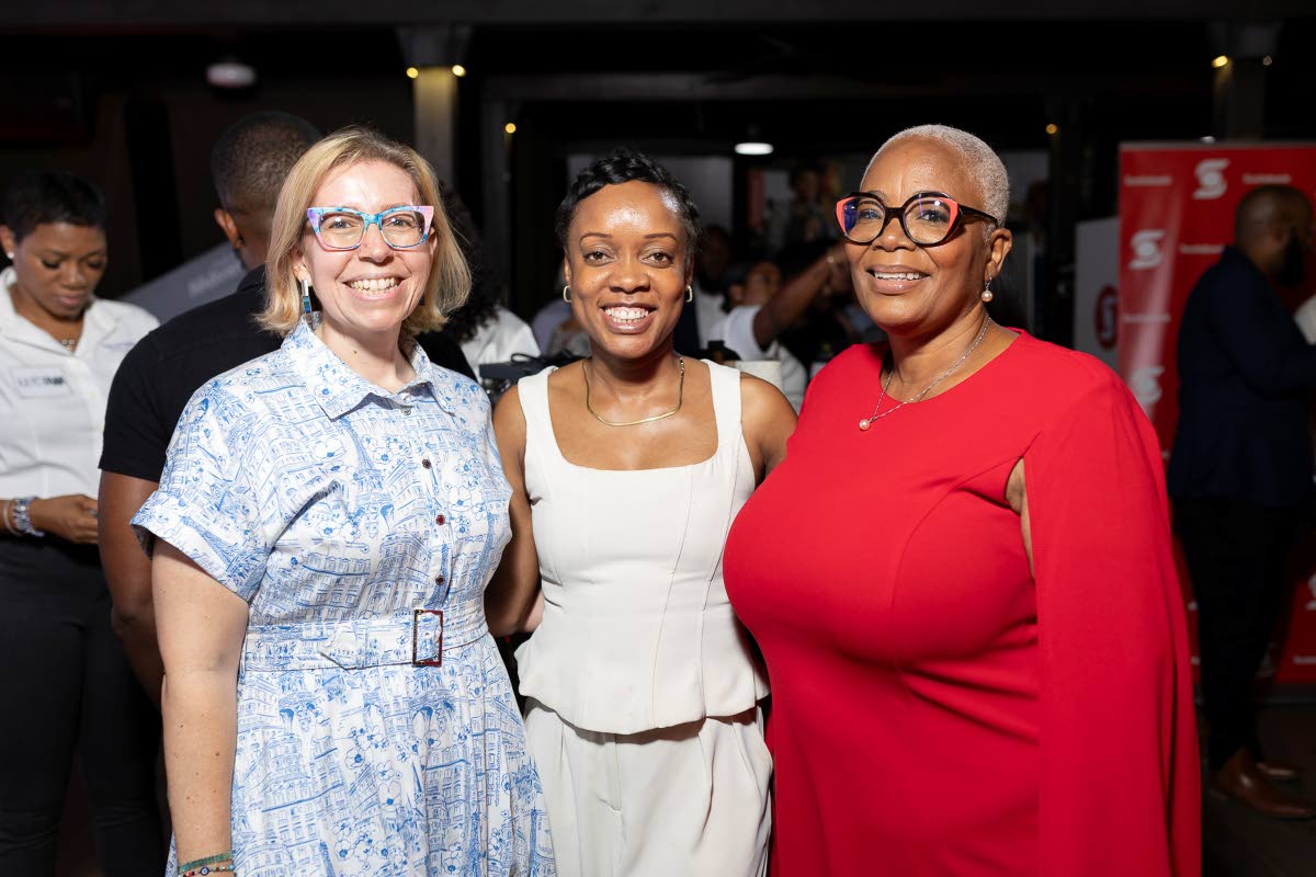 From left: Kathryn Silvera, president of the Jamaica Manufacturers and Exporters Association, joins Scotiabank’s Marketing Manager, Lyshon Davis, and Pam Douglas, senior manager, business banking, flashing a smile for our lens.