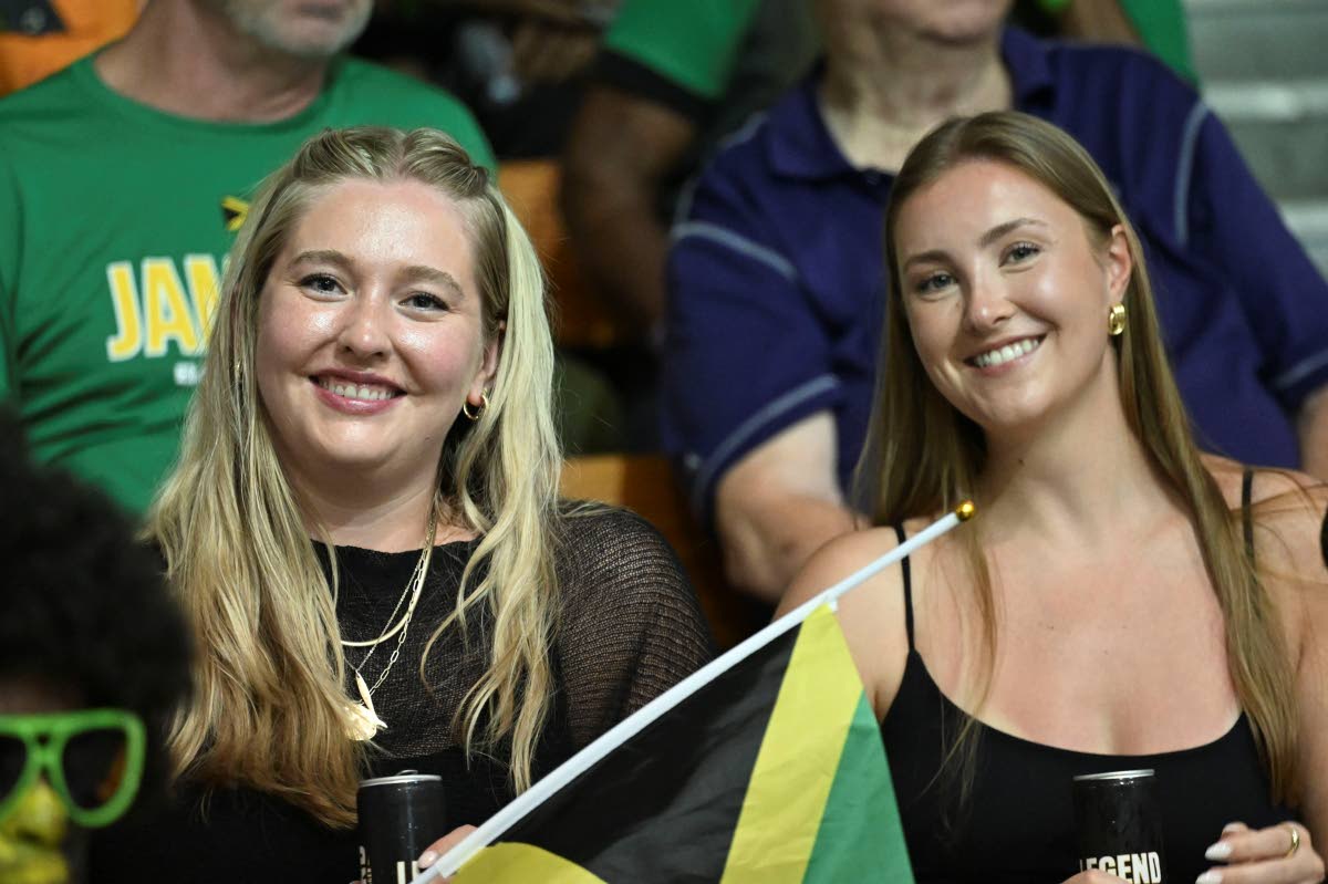 Jamaica’s basketball coach, Rick Turner’s daughter, Scout (left), was a constant in the stands for the island’s pair of FIBA Americas World Cup Qualifer at the National Indoor Sports Centre. 