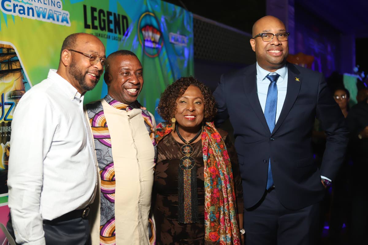 Mayor of Ocho Rios, Michael Belnavis; Mayor of Kingston, Andrew Swaby; Entertainment Minister, Olivia Grange; and State Minister in the Ministry of Industry, Investment and Commerce, Delano Seiveright, are all smiles at the recent launch of Vacae Weekend.