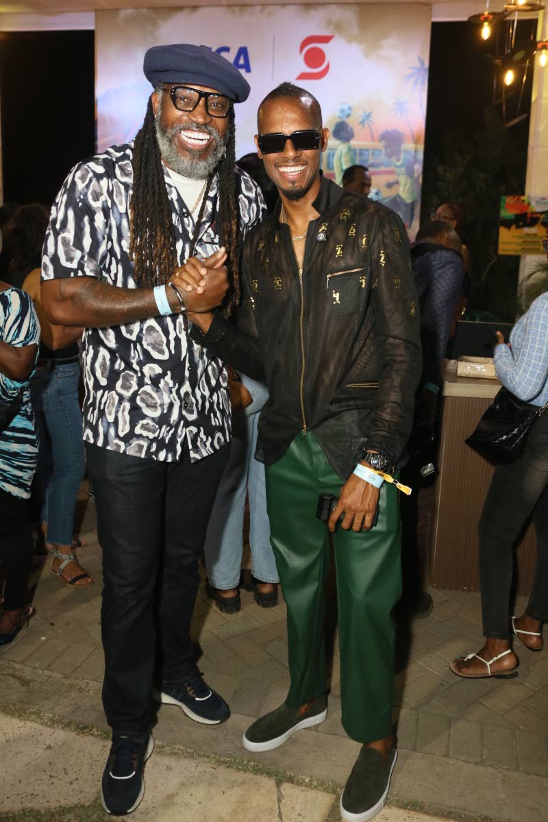 Good vibes and even better company as Jamaican cricketer Chris Gayle (left) and the renowned Chef Brian Lumley do a quick catch-up at Kuyah.