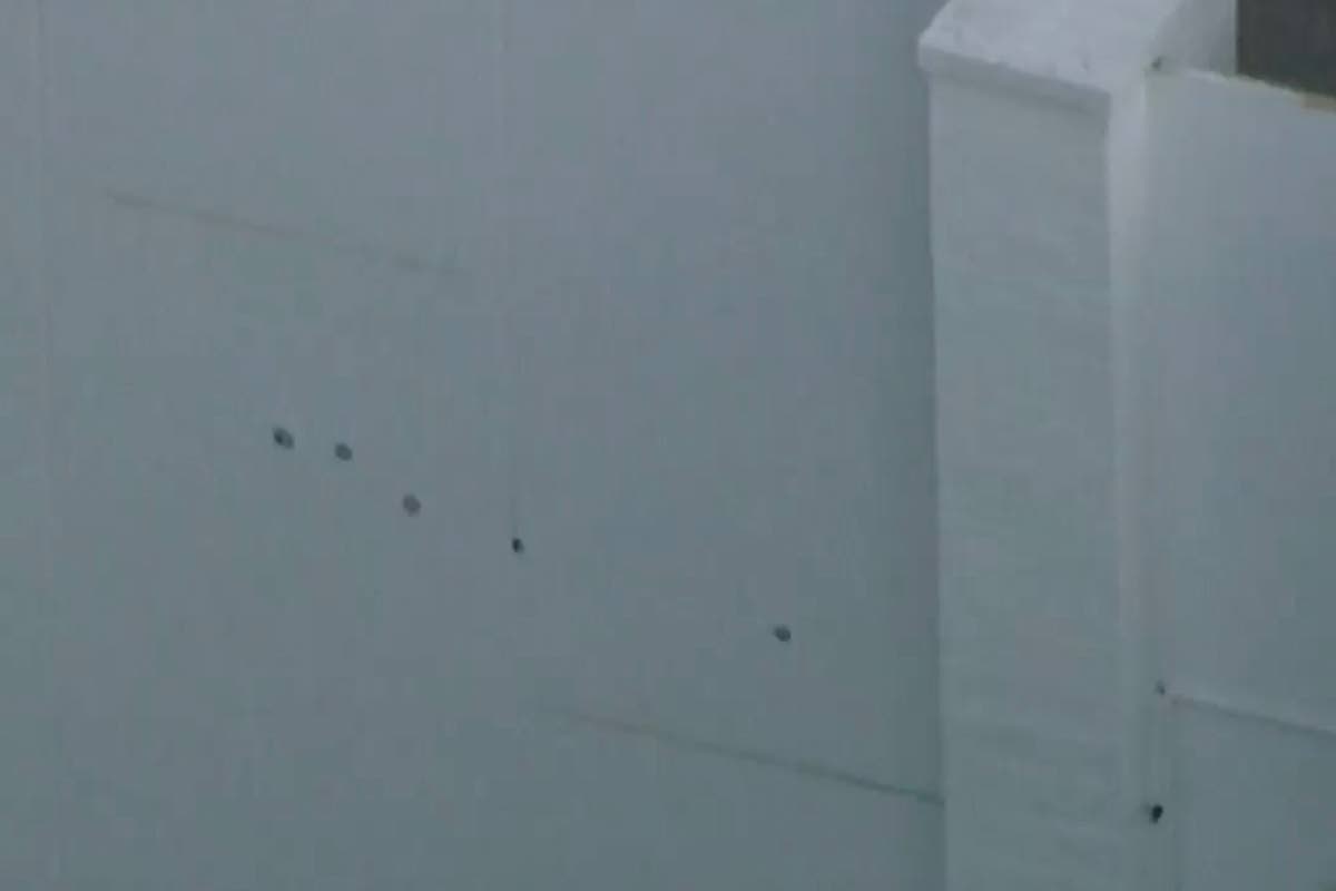 This image taken from video provided by ABC7 Los Angeles on Monday, March 9, 2026 shows what appears to be bullet holes on a wall at singer Rihanna's home in Los Angeles. (ABC7 Los Angeles via AP)