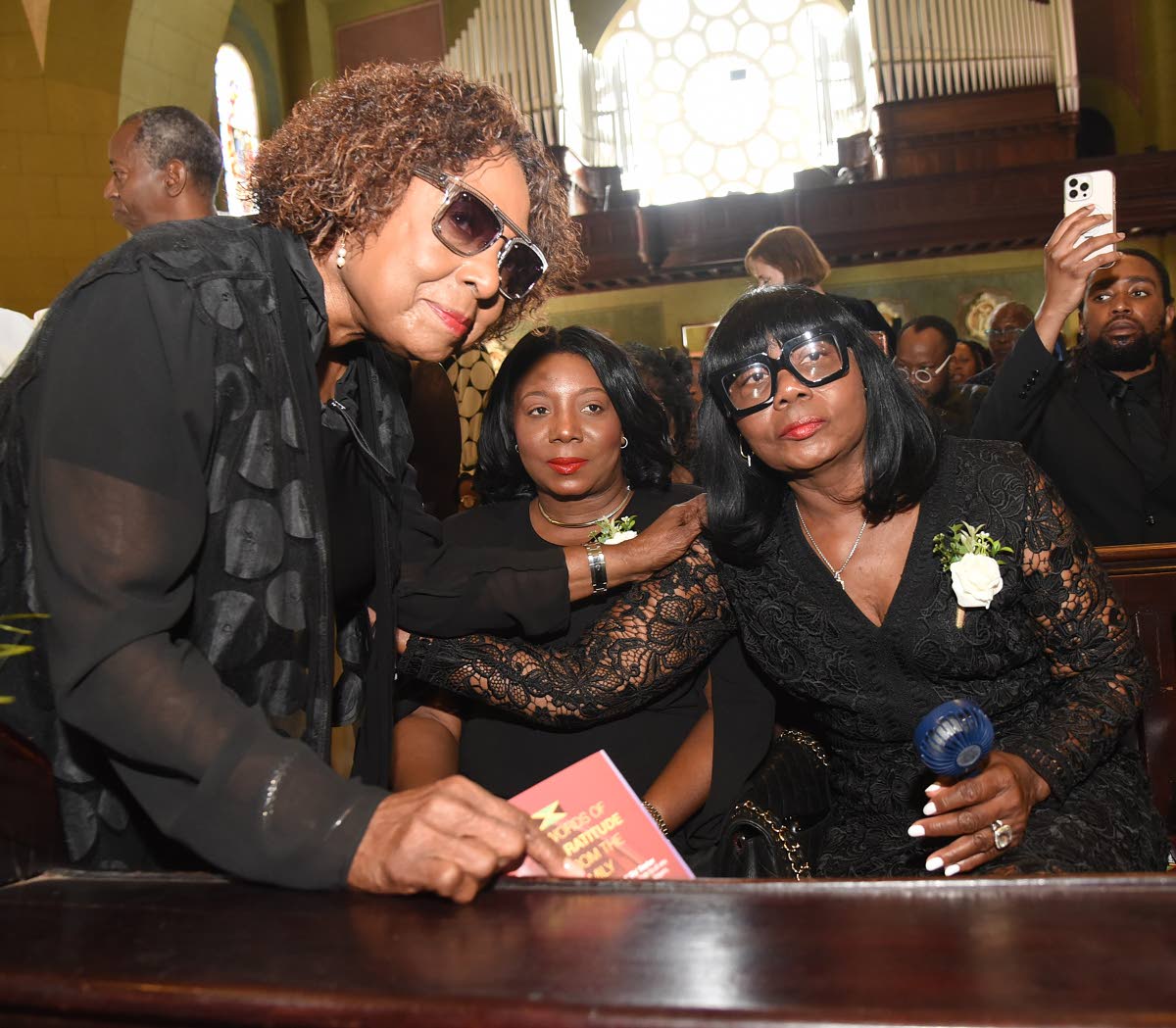 From left: Minister of Culture, Gender, Entertainment and Sport Olivia Grange, Sly Dunbar’s daughter, Natasha and wife, Thelma.